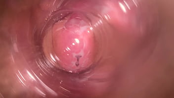 Intense masturbation and internal camera action in a gape-filled vagina