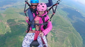 Paragliding adventure with a girl's shaved pussy and hard tits